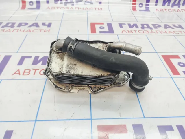 Радиатор масляный Audi A6 (С6) 06E117021G.