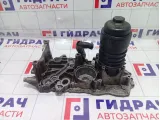 Кронштейн масляного фильтра Audi Q7 057115401AH