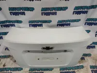 Крышка багажника Chevrolet Aveo T300 95072965 Хорошее состояние Небольшая вмятина.