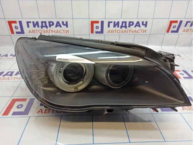 Фара левая BMW 7-Series (F02) 63117228427. Подпаивались крепления.Защитная пленка.