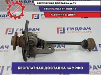 Кулак поворотный задний правый BMW X5 33321095240. В сборе с приводом. Порван пыльник, сломан датчик ABS.
