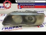 Фара левая BMW X5 63126930215. Дефекты, состояние удовлетворительное.