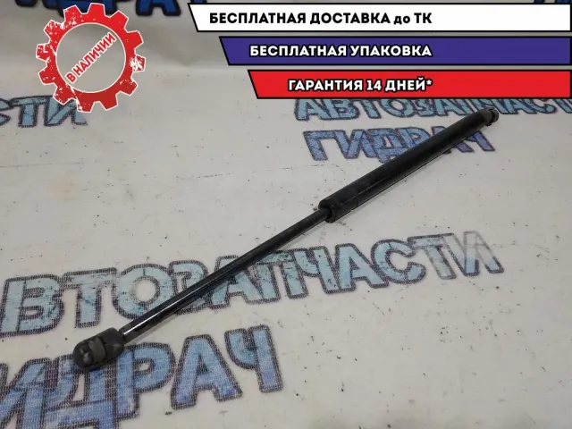 Амортизатор двери багажника Cadillac SRX 25736514. Правый.