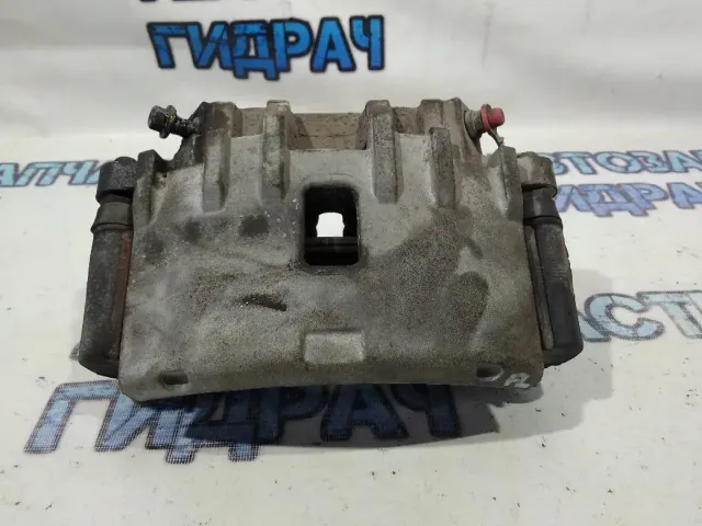 Суппорт тормозной передний левый Cadillac SRX 18047980.