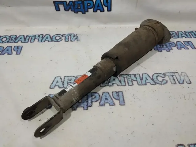 Амортизатор задний Cadillac SRX.