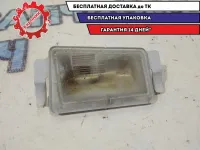 Фонарь подсветки номера Cadillac SRX.