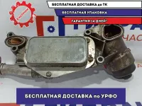 Корпус масляного фильтра Chevrolet Aveo 12992593. в сборе с радиатором.