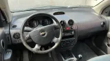 Обшивка двери передней левой Chevrolet Aveo 96449099