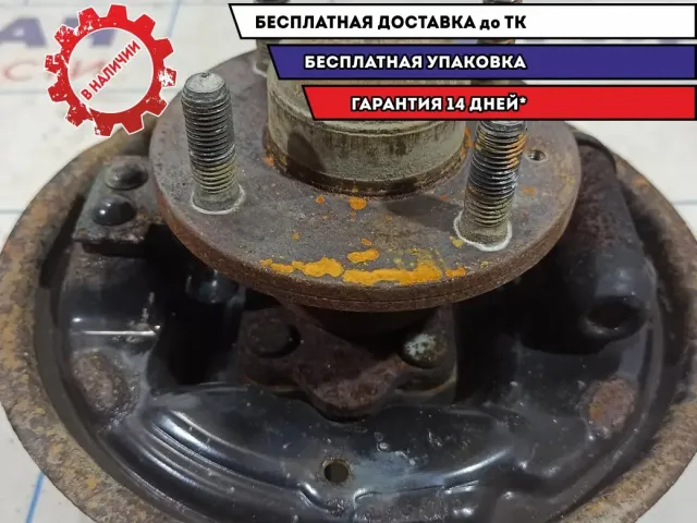 Щит опорный задний правый Chevrolet Aveo T250 96534697. Со ступицей.