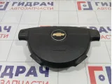 Подушка безопасности в рулевое колесо Chevrolet Aveo 96879041