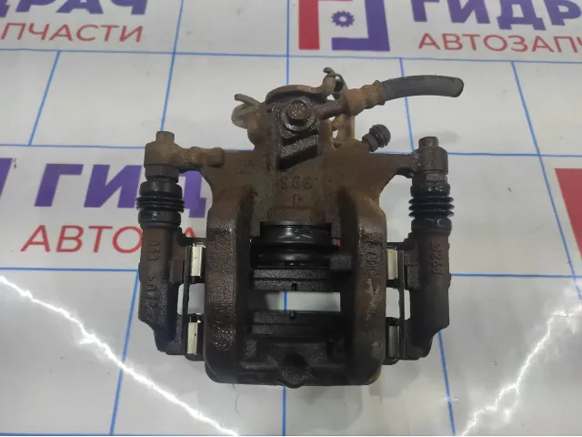 Суппорт тормозной задний правый Chevrolet Cruze 13300864.