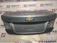 Крышка багажника Chevrolet Cruze 95950847. Вмятина.