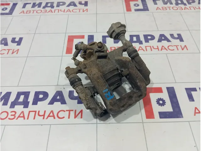 Суппорт тормозной задний левый Chevrolet Cruze 13300861