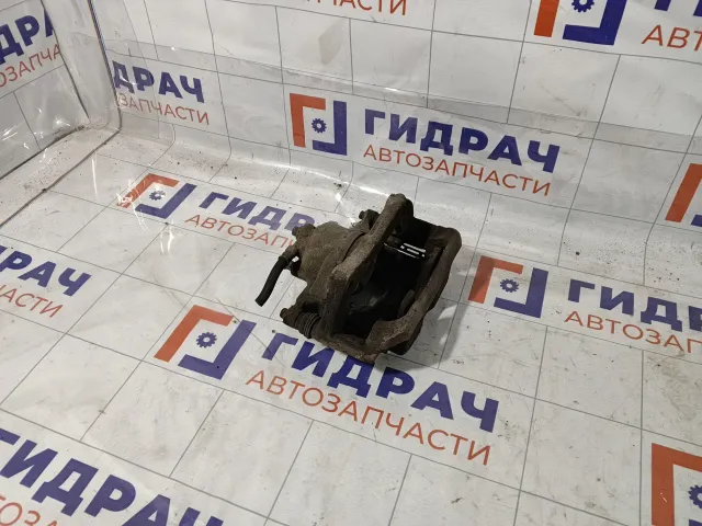 Суппорт тормозной передний левый Chevrolet Cruze 13301189