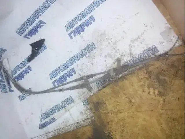 трос ручника левый Chevrolet Lacetti хэтч 1.4