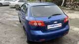 Обшивка стойки средней левой нижняя Chevrolet Lacetti (J200) 96951503