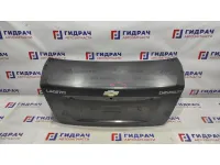 Крышка багажника Chevrolet Lacetti 96474985. Вмятина.