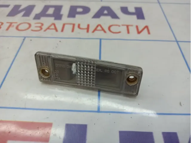 Фонарь подсветки номера правый Chevrolet Spark .