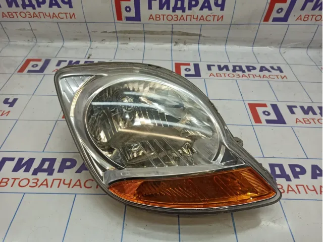 Фара правая Chevrolet Spark 96590405. Потертости.