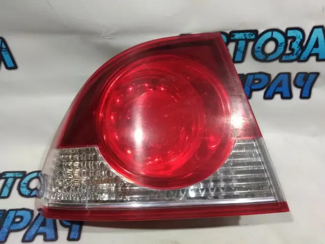 Фонарь задний наружный левый Honda Civic 4D 33551SNBG01.