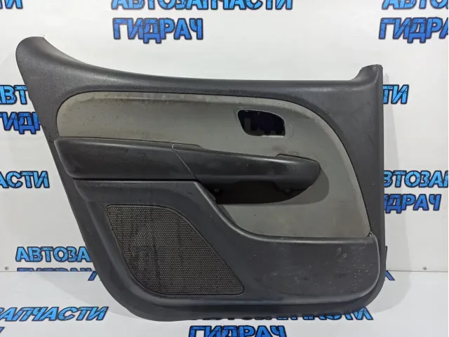 Обшивка двери передней левой Fiat Doblo 735438670.