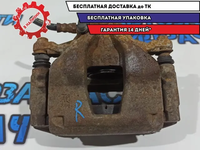 Суппорт тормозной передний правый Fiat Doblo 735386508.