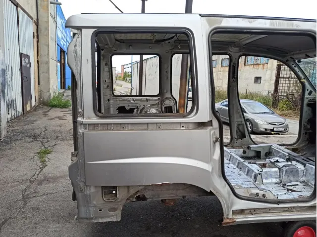 Крыло заднее правое Fiat Doblo . Дефект.