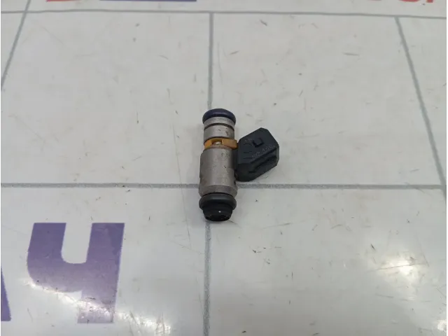 Форсунка инжекторная электрическая Fiat Punto (199) 71724545