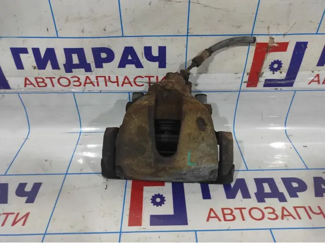 Суппорт тормозной передний левый Ford Focus 3 1682876.