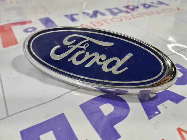Эмблема задняя Ford Focus 1779943