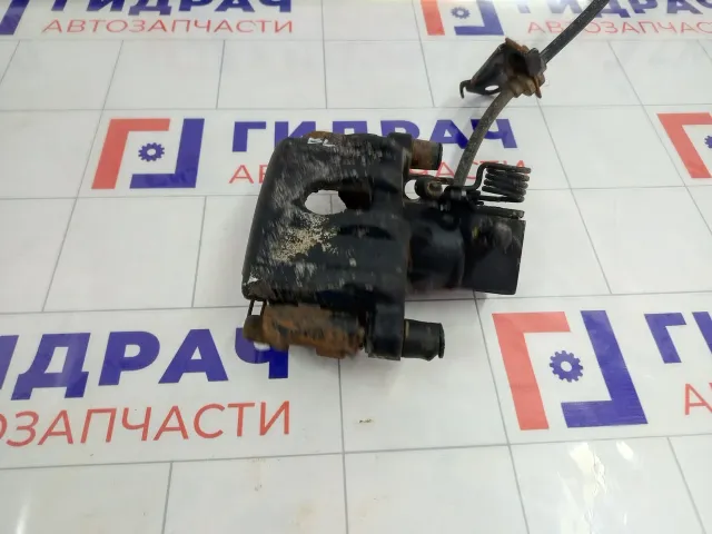 Суппорт тормозной задний левый Ford Focus 2210215