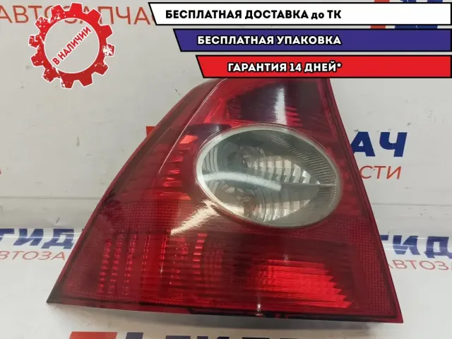 Фонарь задний левый Ford Focus 2 . Аналог. Покрашен тонированным лаком. Сломаны крепления.