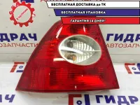 Фонарь задний левый Ford Focus 2 1333834. Дефект. Царапина на стекле.