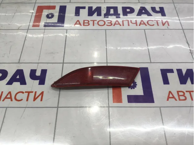 Отражатель в бампер задний левый Ford Focus 3 1763040