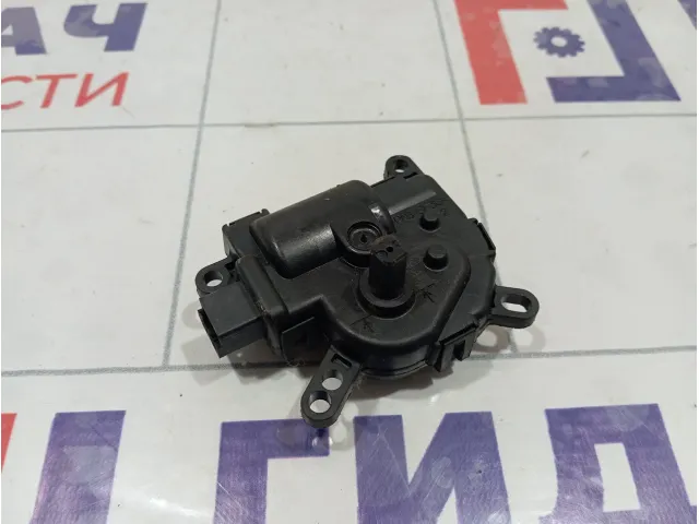 Моторчик заслонки отопителя (печки) Ford Mondeo 1S7H19B634CA