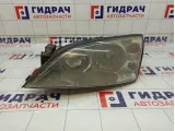 Фара левая Ford Mondeo 1435629