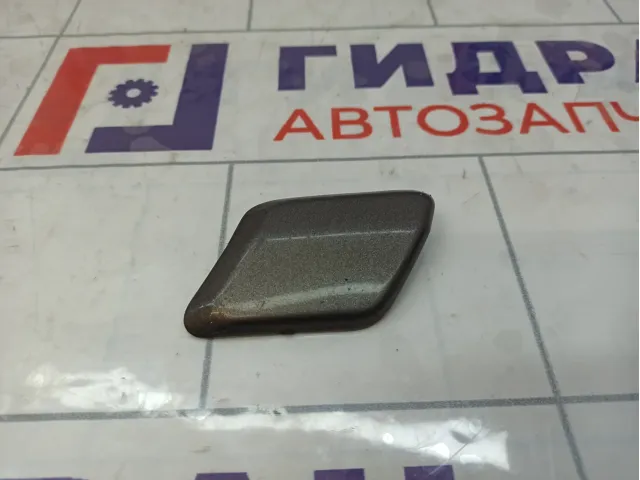 Крышка форсунки омывателя левая Ford Mondeo 7S7113L019AD