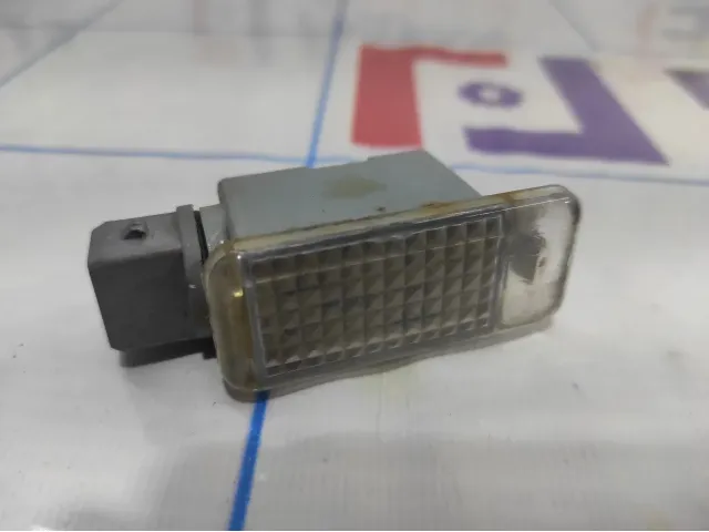 Фонарь подсветки номера Geely Emgrand EC 7 1067001313.