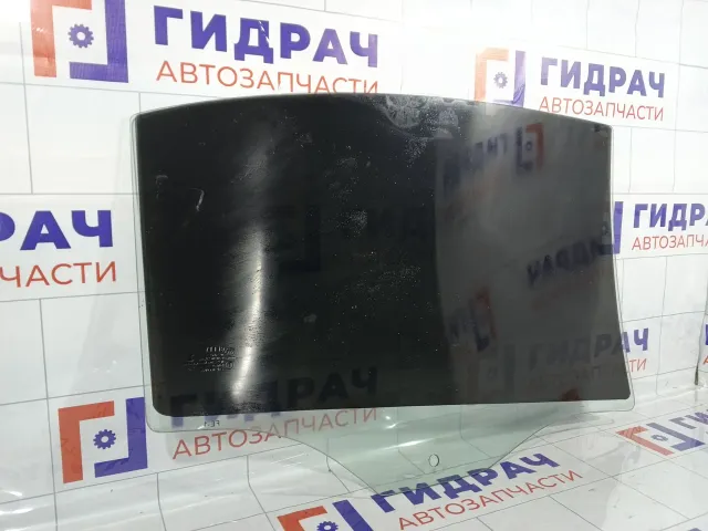 Стекло двери задней левой Geely Emgrand EC7 1068002097