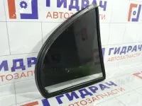 Стекло двери задней левой Geely Emgrand EC7 1068002099