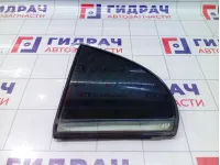 Стекло двери задней левой Geely Emgrand EC7 1068002099