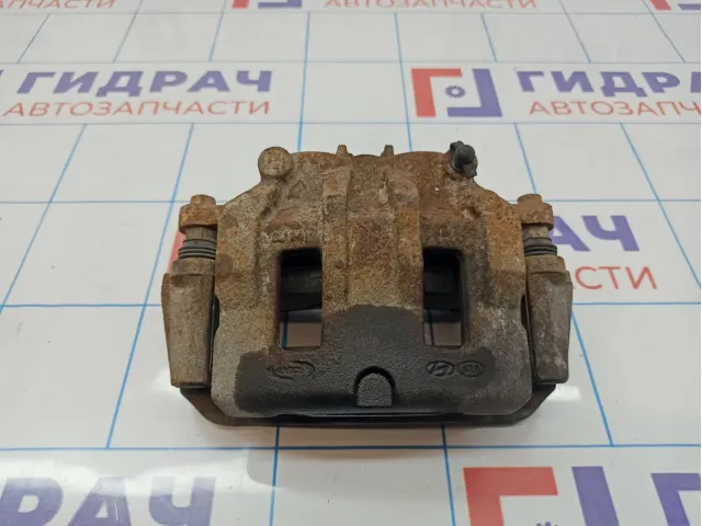 Суппорт тормозной передний правый Hyundai Grand Starex (TQ) 58130-4H000.