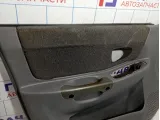Обшивка двери передней левой Hyundai Accent (LC) 8230125140MN