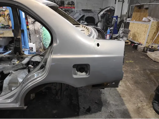 Крыло заднее левое Hyundai Accent 2 . Дефект.Ремонтировалась.