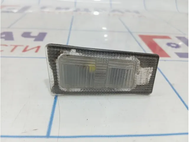 Фонарь подсветки номера правый Hyundai Avante (MD) 925021M400