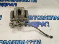 Суппорт тормозной задний левый Hyundai Avante 2012