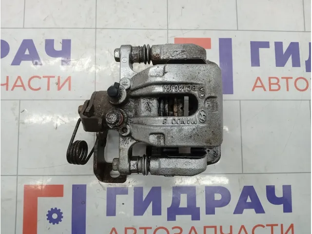 Суппорт тормозной задний правый Hyundai Elantra 582303X300