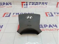 Подушка безопасности в рулевое колесо Hyundai Grand Starex/Starex H1 (TQ) 569004H000WK