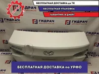 Крышка багажника Hyundai Solaris 2 69200-H5000. Вмятина.