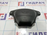 Подушка безопасности в рулевое колесо Hyundai Starex (A1) 569004A100LK